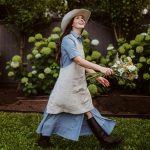 joyful-woman-gardening-in-springtime after discovering a variety of creative ways to use mulch
