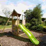 playground with wood chips as ground cover as part of Sustainable Wood Practices