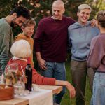 Family enjoying a relaxed Mother’s Day appreciation moment together outdoors with simple shared time