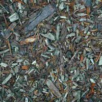Wood chips used as mulch to protect soil, retain moisture, and improve garden soil health